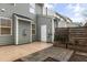 Exterior view of townhome with gray siding, white trim, and patio at 717 Grace Hodge Dr, Cary, NC 27519