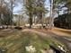 Multiple mobile homes and parked vehicles arranged around a shared driveway at 923 Sunny Ln, Raleigh, NC 27603