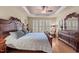 Large bedroom with plush carpeting, classic furnishings, and ample natural light at 1105 Ventnor Pl, Cary, NC 27519