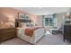 Inviting bedroom with soft carpet, large window, and stylish decor at 119 Ethel Ln, Angier, NC 27501