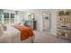 Bright bedroom with plush carpet, a comfy bed, and a view of the ensuite bathroom at 119 Ethel Ln, Angier, NC 27501