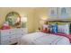 Charming bedroom with owl-themed decor and a white dresser at 119 Ethel Ln, Angier, NC 27501