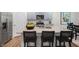 Modern kitchen with stainless steel appliances, granite countertops, and an island with seating at 119 Ethel Ln, Angier, NC 27501