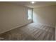 Additional bedroom with carpeted floors and neutral walls at 193 Magnolia Run Way, Benson, NC 27504