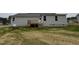 New construction home featuring a raised wooden back deck, siding and large grassy backyard at 193 Magnolia Run Way, Benson, NC 27504