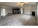 Open plan living and dining area adjacent to kitchen at 193 Magnolia Run Way, Benson, NC 27504