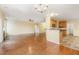 Inviting living room featuring hardwood floors, a fireplace, and an open floor plan at 2204 Regent Ct, Creedmoor, NC 27522