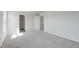 Spacious bedroom with carpeted floors, an ensuite bathroom, and ample natural light at 228 Maggie Ln, Roxboro, NC 27573