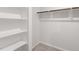 Spacious walk-in closet with built-in shelving at 228 Maggie Ln, Roxboro, NC 27573