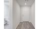 Entryway with access to a bathroom and a simple white door at 228 Maggie Ln, Roxboro, NC 27573