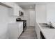 Kitchen with white cabinetry, stainless steel appliances, and ample counter space at 228 Maggie Ln, Roxboro, NC 27573