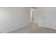 Spacious bedroom with carpet flooring, white walls, and closet doors at 432 Ashley Run, Sanford, NC 27330