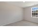 Bright, unfurnished bedroom with a large window at 432 Ashley Run, Sanford, NC 27330