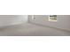 Expansive bedroom with neutral carpeting and several windows at 432 Ashley Run, Sanford, NC 27330