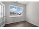 Bright home office with large windows and wood-look flooring at 432 Ashley Run, Sanford, NC 27330