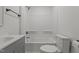 Clean and modern bathroom with a shower/tub combo, vanity, and toilet at 112 Edgewood Dr, Roxboro, NC 27573