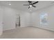 Bright bedroom with ensuite bathroom and carpet flooring at 112 Edgewood Dr, Roxboro, NC 27573
