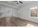 Dining area with wood-look flooring and access to the front door at 112 Edgewood Dr, Roxboro, NC 27573