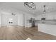 Open concept kitchen and dining area with stainless steel appliances at 112 Edgewood Dr, Roxboro, NC 27573