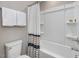 Bathroom with bathtub, shower curtain, and white fixtures at 255 Whitley Ridge Dr # 248, Clayton, NC 27527