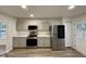 Modern kitchen with stainless steel appliances and light cabinets at 2816 Smoke Pl, Raleigh, NC 27610