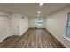 Spacious living room with hardwood floors and lots of natural light at 2816 Smoke Pl, Raleigh, NC 27610