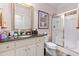 Bathroom features a granite vanity, a walk-in shower, and tile flooring at 4109 Cheek Point Pl, Burlington, NC 27215