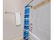 Bathroom with a tub/shower combination and blue striped shower curtain at 4109 Cheek Point Pl, Burlington, NC 27215