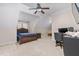 Bedroom with a bed, a desk, and a ceiling fan at 4109 Cheek Point Pl, Burlington, NC 27215