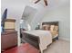 Well-lit bedroom with a sleigh bed, carpeted floors, and a ceiling fan at 4109 Cheek Point Pl, Burlington, NC 27215