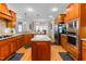 Well-appointed kitchen with ample counter space, modern appliances, and hardwood flooring at 4109 Cheek Point Pl, Burlington, NC 27215