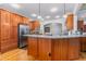 Modern kitchen with stainless steel appliances, granite countertops, and ample cabinet space at 4109 Cheek Point Pl, Burlington, NC 27215