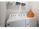 Laundry room with Whirlpool washer and dryer at 466 Belgian Red Way, Wake Forest, NC 27587