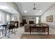 Spacious living room with a fireplace and ample natural light at 115 Clancy Cir, Cary, NC 27511