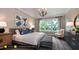 Spacious main bedroom with a king-size bed and stylish furnishings at 259 August Trce Dr, Pittsboro, NC 27312