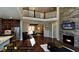 Open living room with hardwood floors, fireplace, and high ceilings at 259 August Trce Dr, Pittsboro, NC 27312