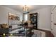 Home office with built-in shelving, a workspace, and comfortable seating at 259 August Trce Dr, Pittsboro, NC 27312