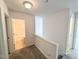 Hallway view showcasing access to a bathroom and other rooms at 404 Dyersville Dr, Morrisville, NC 27560