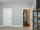 Spacious bedroom with double door closet and hallway view at 415 Brazil Nut Ln, Smithfield, NC 27577