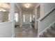 Light-filled entryway with view to dining area at 596 Ravensworth Dr, Garner, NC 27529