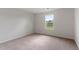 Empty bedroom with neutral walls and carpeting, ready for personalization at 604 Rhino Bnd, Oxford, NC 27565