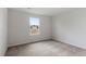 Bright and airy bedroom with plush carpeting and a large window providing natural light at 604 Rhino Bnd, Oxford, NC 27565