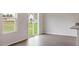 Dining area with sliding glass door to backyard and wood-look flooring at 604 Rhino Bnd, Oxford, NC 27565