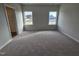 Spacious bedroom with neutral carpeting and ample natural light at 82 Vili Dr, Broadway, NC 27505