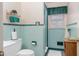 Light and bright bathroom with teal tile and a shower/tub combo at 101 Crestview Rd, Rocky Mount, NC 27801