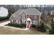 Aerial view of a two-story house with a large yard at 10620 Silverwood Creek Dr, Raleigh, NC 27614