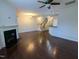 Spacious living room with hardwood floors, fireplace and view of kitchen at 204 Stockton Gorge Rd, Morrisville, NC 27560