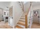 Modern staircase with light wood treads and white risers at 2222 Woodrow St, Durham, NC 27705