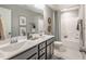 Double vanity bathroom with a shower/tub combo at 269 Ivy Ridge Rd, Chapel Hill, NC 27516