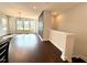 Bright living room with hardwood floors and large windows at 2823 Dallas Valley Ln, Apex, NC 27502